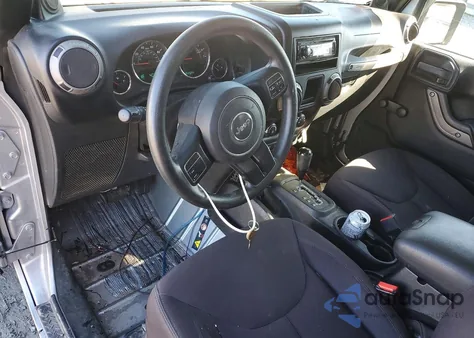 2013 Jeep Wrangler Sport z USA, uszkodzony, nr VIN 1C4AJWAG4DL688931